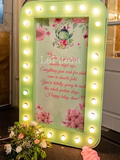 An illuminated frame with a heartfelt birthday message, adding a warm and personal touch to the decor.