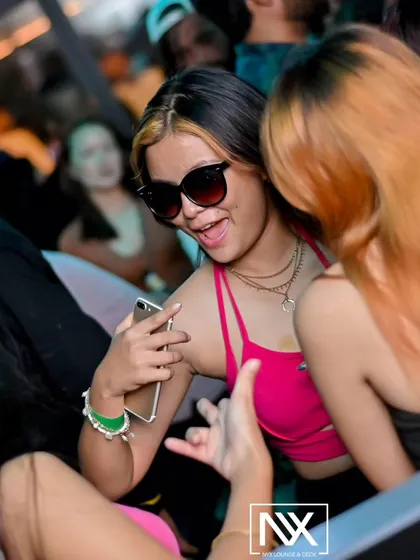 A guest capturing the moment on her phone. My parties are all about making memories.