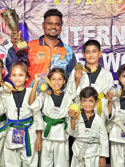 Another shot of our proud medal winners at the International Taekwondo Championships, celebrating their individual and team achievements.