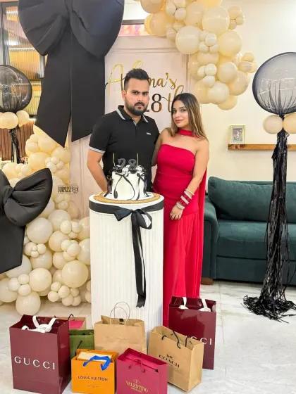 A picture perfect moment from Ashima's 28th birthday. Our bow-themed decor created the perfect backdrop for the birthday girl and her partner to capture memories next to the cake.