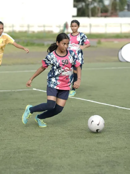 An action shot from the SIS Powerplay 5v5 Women's Tournament, with one of our U16 players driving forward with the ball. This demonstrates the confidence and attacking mindset we encourage in our players.