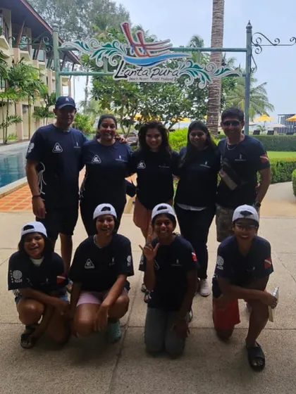 The whole team, young and old, after a successful PADI certification course in Koh Lanta, Thailand. It's a proud moment for everyone.