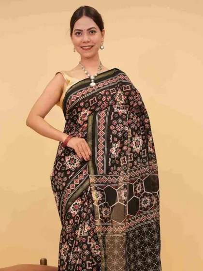This black printed Kota Doria saree is a lightweight and elegant option from my 1-Minute collection. It’s perfect for both casual and semi-formal events, offering comfort and style.