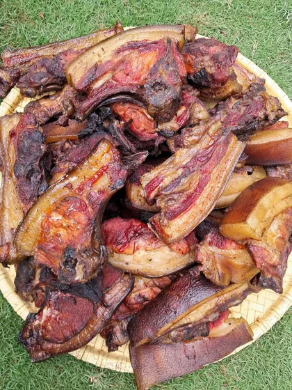 A fresh batch of our firewood-smoked pork, direct from Nagaland. You can see the rich color and texture that comes from the slow smoking process, a taste of home that we're proud to share.