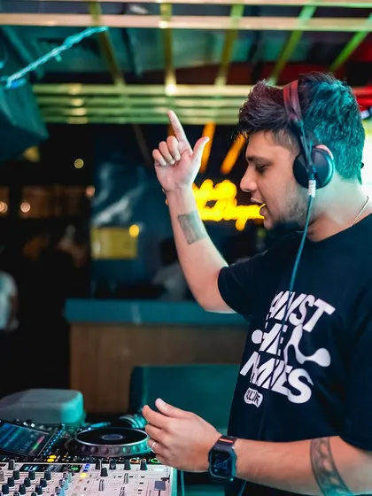 In the zone, cueing up the next track to keep the party going.