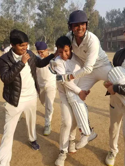 The joy of a teammate's success. Here the boys celebrate Rytham's magnificent match-winning innings. This camaraderie is the heart of our academy.