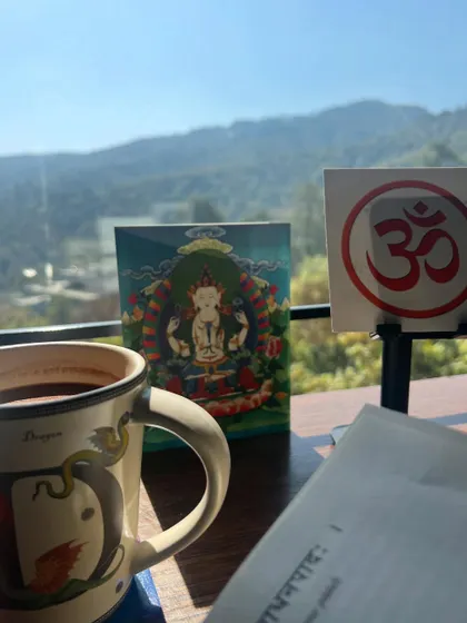 My morning sadhana setup: Om meditation, study of the Yoga Sutras, and a warm cup of cacao. My practice is built on Tapas (discipline), Svadhyaya (self-study), and Ishvara Pranidhana (devotion).
