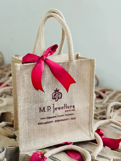 A clean, simple shot of our custom jute bag, showcasing the elegant branding and quality craftsmanship.