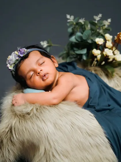 A duplicate of image 109, a classic and serene newborn portrait.