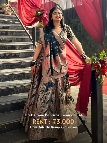A dark green Banarasi lehenga set that offers a touch of traditional elegance. Perfect for a classic wedding look.