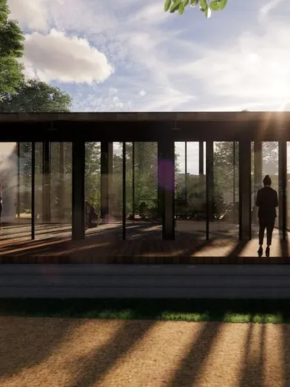 A front view of the Sakleshpur resort hall concept. The design emphasizes transparency, with floor-to-ceiling glass that blurs the line between inside and out, allowing guests to feel immersed in nature.