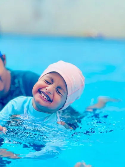 The pure joy of learning to swim. Our lessons are filled with laughter and positive reinforcement, making the pool a place where children feel happy and accomplished.