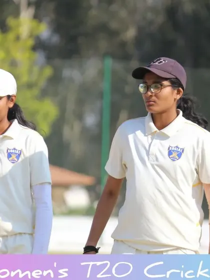 Two players from the CBR Women's T20 Cricket Cup on the field between overs.