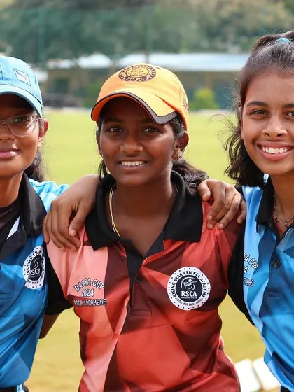 Three friends and teammates share a happy moment during the Dasara Cup.