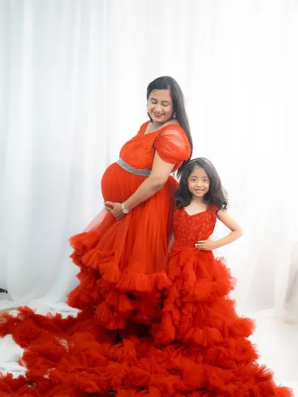 Create beautiful memories with your little one. I offer matching mom-and-daughter gowns for rent, perfect for family photoshoots or to include your older child in your maternity session.