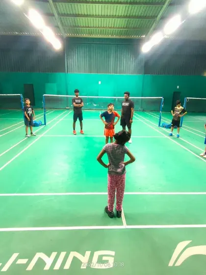A group of our youngest players listening to instructions from a coach before starting a drill.