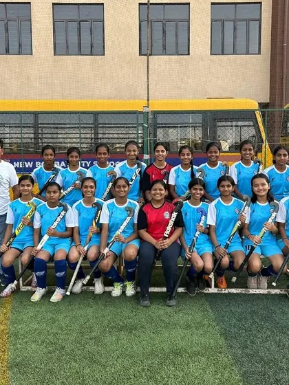 The Hockey Thane Sub-Junior girls team stands with their coaches before competing in the Asmita State Hockey League. We prepare our teams to face any challenge with confidence.