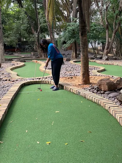 Our mini-golf course is thoughtfully designed to be both fun and challenging, winding its way through a beautiful, shaded part of the resort.