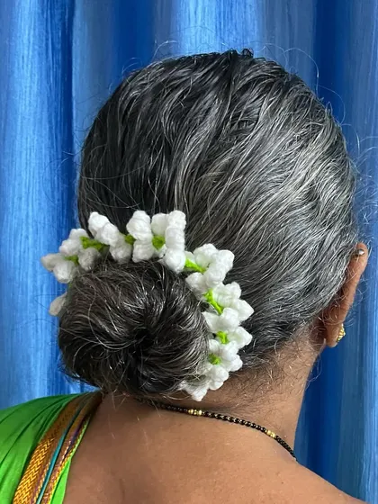 This is my Aaji, the inspiration behind my craft, wearing a traditional jasmine gajra I crocheted for her. Seeing her smile is my greatest reward and it’s why I love making these timeless pieces.