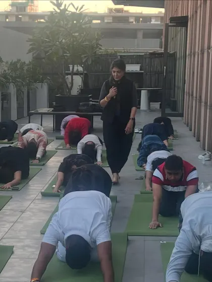 Guiding the Chanel team through a gentle flow on their office rooftop. I believe in bringing yoga to people where they are, making it a part of their daily lives.