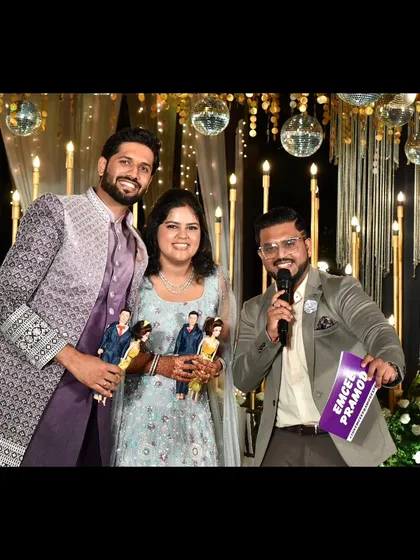 The smiles say it all! Posing with the happy couple after a fantastic Sangeet night. My goal is to make the couple feel like the stars of the show, creating memories they'll cherish forever.