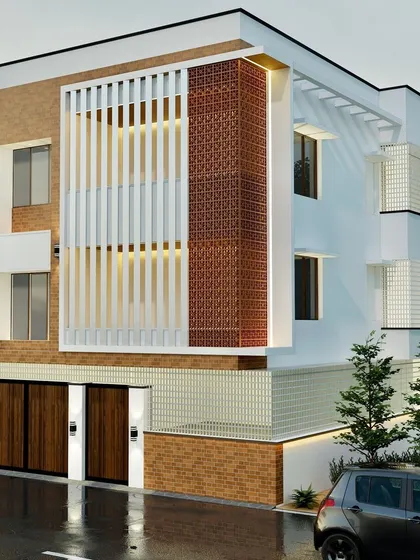 A modern residence where traditional jaali brickwork creates a dynamic play of light and shadow. This facade design is a testament to my love for blending heritage materials with clean, contemporary lines to build homes that feel both new and timeless.