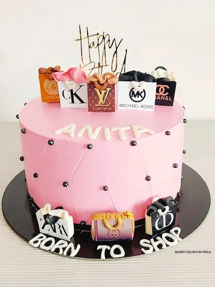 A cake for a shopaholic who is "Born to Shop." This pink design is adorned with edible shopping bags from all her favorite luxury brands like Chanel, Louis Vuitton, and Michael Kors.
