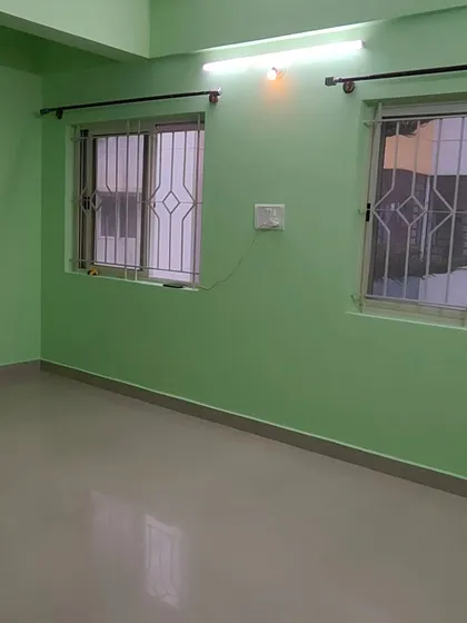 This series of images shows a complete apartment repaint. We used a pleasant light green color to give the entire home a consistent and clean appearance, perfect for a rental unit.