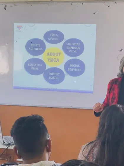 During orientation, our director explains the holistic development approach of the YMCA, covering education, sports, and social services.
