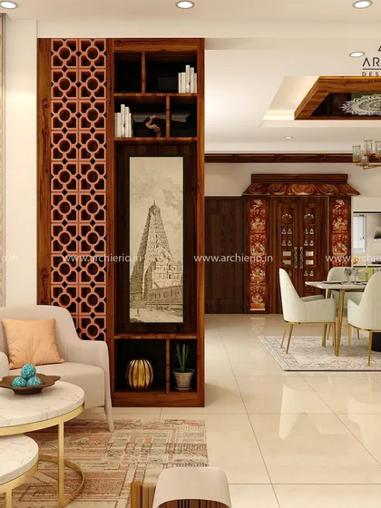 This design uses a traditional wooden jali partition to separate the living and dining areas. The intricate screen adds a decorative element while maintaining a sense of openness.