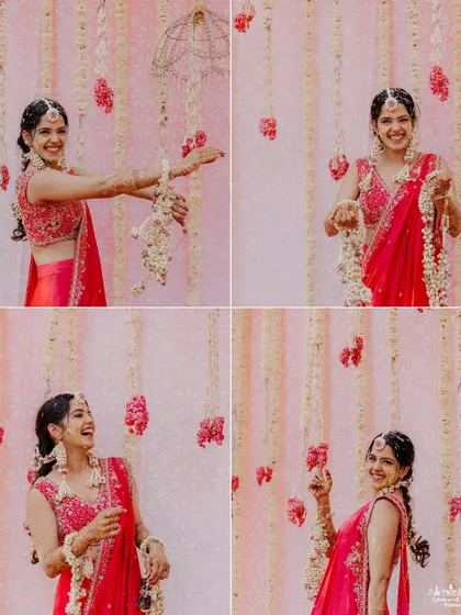 The bride, Kriti, playfully posing with floral jewelry during her vibrant Haldi ceremony in Agra.