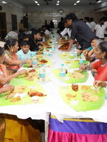 Our team leader personally serving the main family table, ensuring the most important guests are well taken care of.