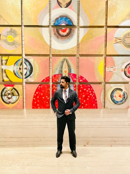 Standing before a vibrant art wall. As a visual storyteller, I am constantly surrounded by and seeking out inspiration in colors, patterns, and forms.