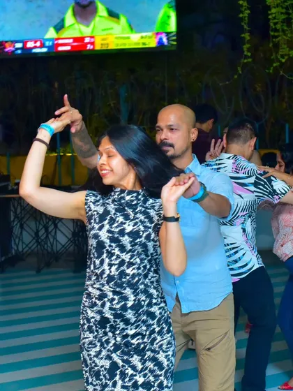 A stylish and confident pair moving together.