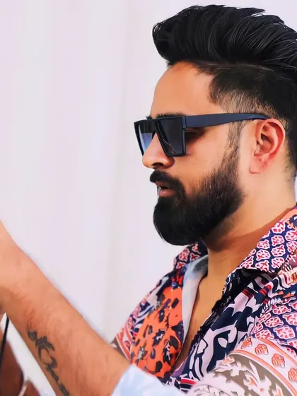 A side profile from a photoshoot, highlighting a sharp and modern look.