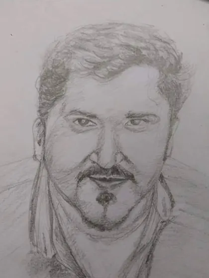 A male portrait sketch focusing on capturing facial structure and hair texture. Learning to draw realistic portraits is a core part of our curriculum, building observational skills that are valuable for any aspiring artist or designer.