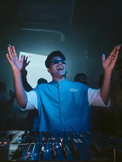 Hands up, feeling the energy from the crowd. This is the moment of connection that makes every night worth it.
