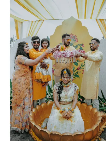 A duplicate of the beautiful lotus vessel Haldi shot, a unique and memorable part of the ceremony.