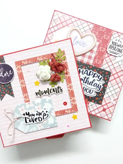 This elegant scrapbook was customized for a couple. It features a mix of floral elements and modern patterns, perfect for treasuring their favorite moments together.