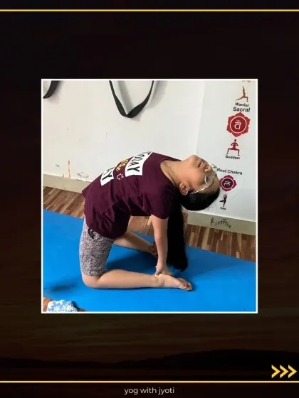With great concentration, this student holds Ustrasana, a pose that is beneficial for the entire body.