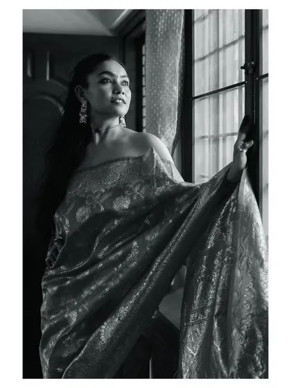 A black and white version of a beautiful ethnic portrait. The monochrome conversion adds a timeless and artistic quality to the image.