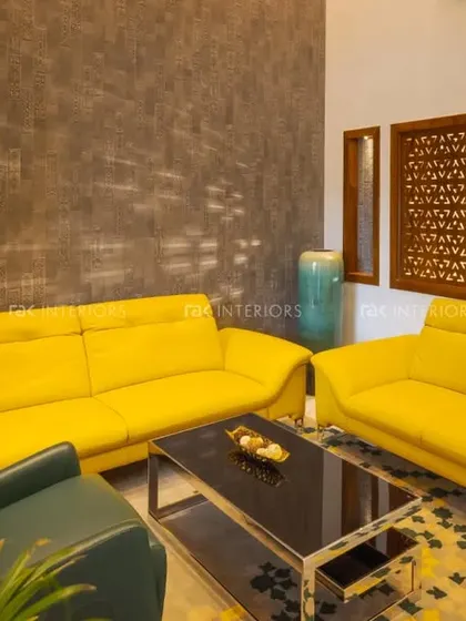 A vivid living room design with bright yellow sofas that bring energy and life to the space.