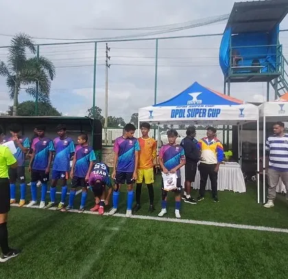 Players lining up for inspection by the referee before a DPDL Super Cup match.