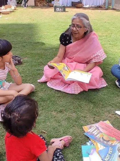 Children gathered around for a storytelling session at the Kids Kona.