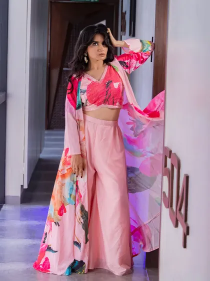 A full-length shot of the floral co-ord set, showing how the makeup and styling create a cohesive and fashionable look.