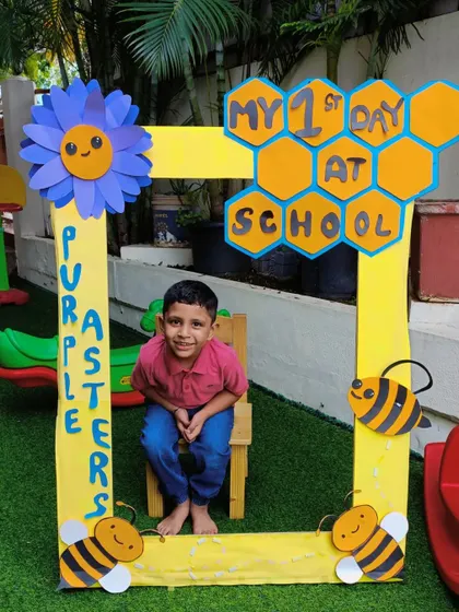 A duplicate of a previous image, showing a student in the 'First Day' photo frame.