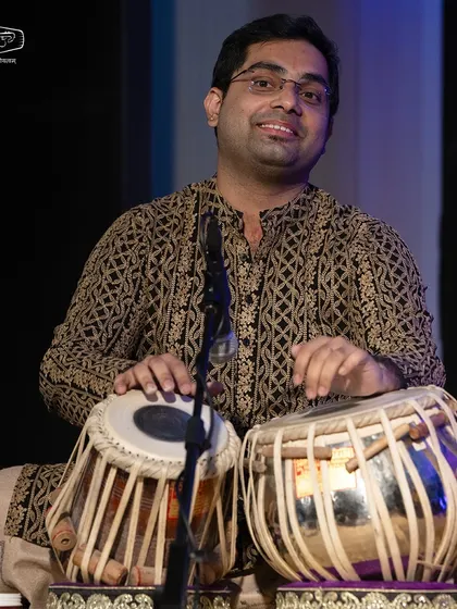 A smile captured during the Kanchanotsava 2024 performance with bansuri artist Shadaj Godkhindi. The joy of creating music together is what makes these collaborations so special.