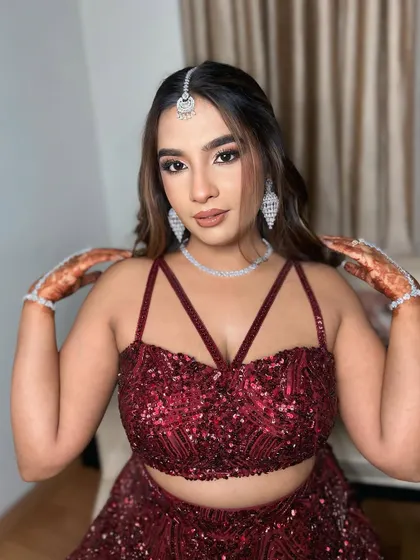 A full portrait of this engagement beauty. The makeup, hair, and outfit all come together to create a show-stopping look.