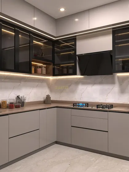 Another angle of the Gaur Saundaryam kitchen render, showing the L-shaped layout and the sleek, handle-less cabinetry. The design includes a hanging planter box over the breakfast counter, adding a touch of nature.