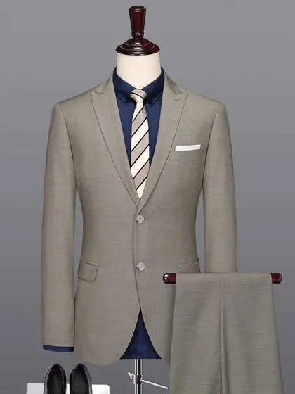Another angle of our grey two-piece suit, highlighting its sharp cut and quality fabric.